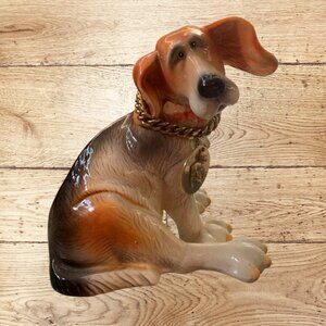 A ceramic hound dog figurine made by Pacific Rim.